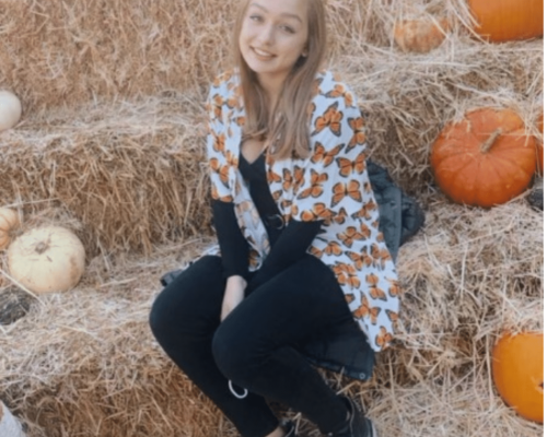 Caroline Cooley is a Listen and Talk alumni student. She is a white woman with brown hair.