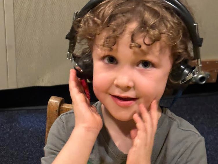 Image of a boy wearing headphones