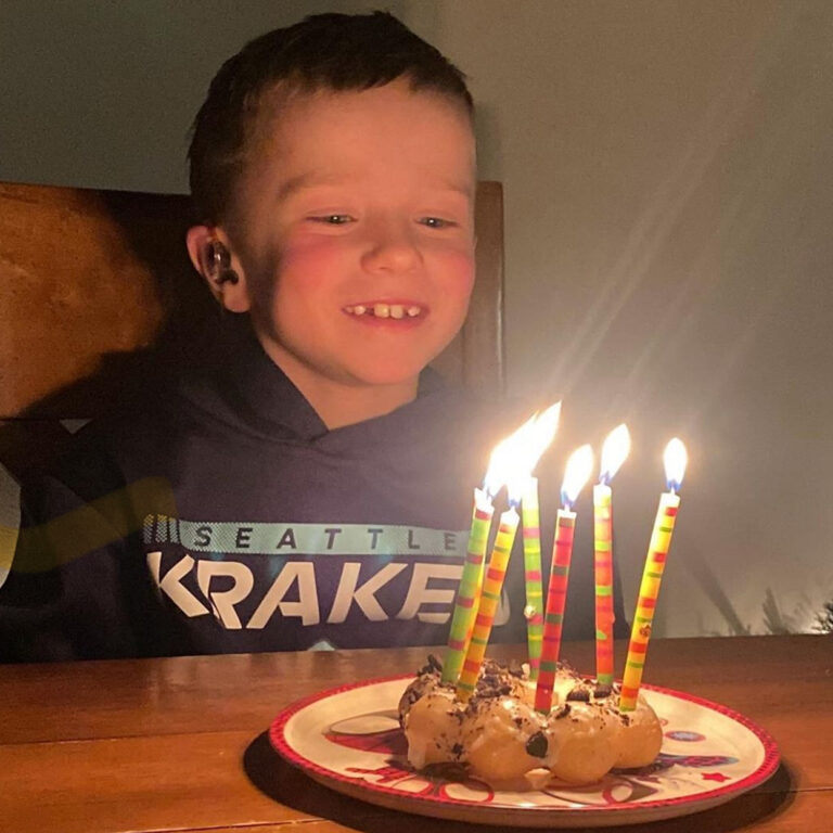 Alum Caleb celebrating his most recent hearing birthday.